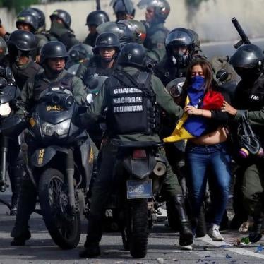 A demonstrator is detained by security forces during a protest against Venezuelan President Nicolas Maduro's government in Caracas, Venezuela, July 10, 2017.