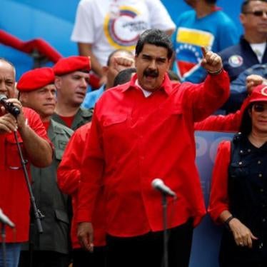 Venezuela's President Nicolas Maduro (C), his wife Cilia Flores and Diosdado Cabello, deputy of Venezuela's United Socialist Party, attend the closing campaign ceremony for the upcoming Constituent Assembly election in Caracas, Venezuela July 27, 2017.