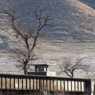 North Korean soldiers in a border guard post are seen from the Chinese side in Tumen, China, January 7, 2016. 