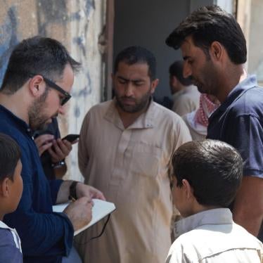 Author interviewing local Tabqa residents after ISIS had been pushed out of city (July 2017).