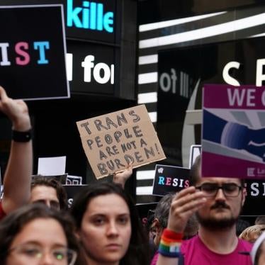 People protest U.S. President Donald Trump's announcement that he plans to reinstate a ban on transgender individuals from serving in any capacity in the U.S. military, in Times Square, in New York City, New York, U.S., July 26, 2017.