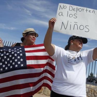Border residents and members of the Border Network for Human Rights (BNHR) protest to reject border militarization and the deportation of children, outside a detention center in Montana, Texas August 24, 2014.