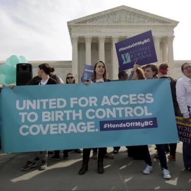 Supporters of contraception rally before Zubik v. Burwell, an appeal brought by Christian groups demanding full exemption from the requirement to provide insurance covering contraception under the Affordable Care Act, is heard by the U.S. Supreme Court in