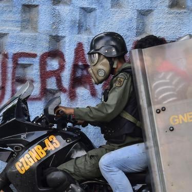 A protestor is arrested by the National Guard during an anti-government demonstration in Caracas on July 27, 2017. 