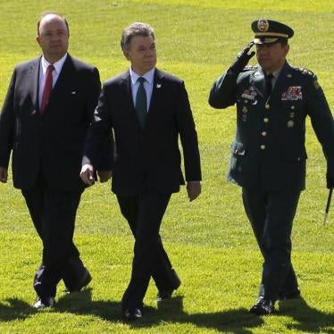 Colombia's President Juan Manuel Santos, Colombia's Defense Minister Luis Carlos Villegas and Colombian armed forces chief Gen. Juan Pablo Rodriguez