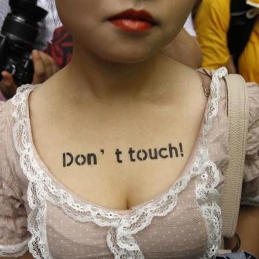 A woman takes part in a SlutWalk protest, in central Seoul July 16, 2011.
