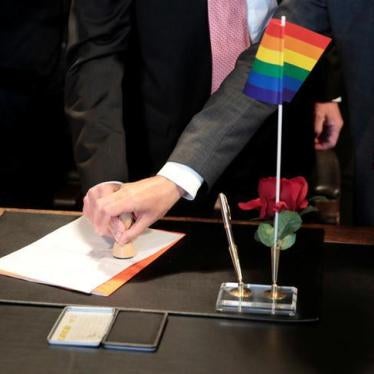 Same-sex couple get married at a registry office in Germany.