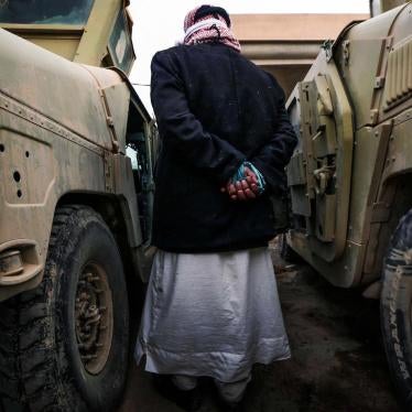An ISIS suspect held for questioning by Iraqi forces near Mosul.