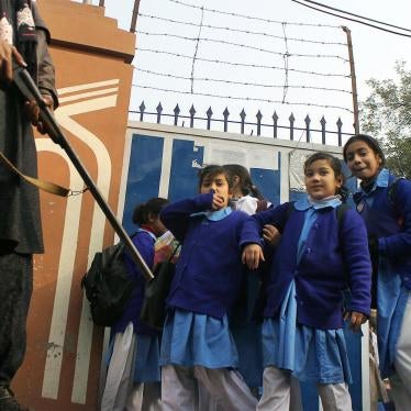 Pakistani students in Lahore return to school under high alert security after the December 16, 2014 attack by the Pakistani Taliban on the Army Public School in Peshawar, January 1, 2015.
