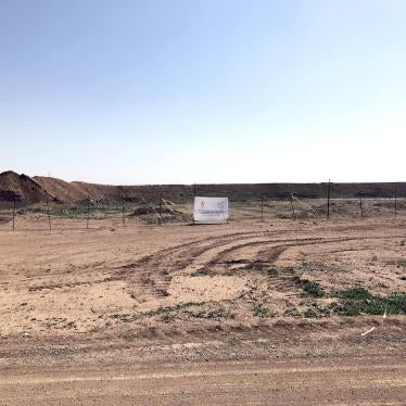 ‘Hammam al-Alil mass grave marked and fenced’ Caption: A marked and fenced ISIS mass grave in Hammam al-Alil, 30 kilometers south of Mosul, discovered in November 2016.