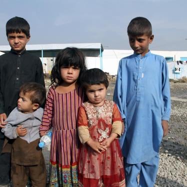 Five returning Afghan refugee children wait for their parents to register at the UN refugee agency’s support center outside Kabul after being forced out of Pakistan in October 2016. Almost 600,000 Afghans, including 360,000 registered refugees, returned h