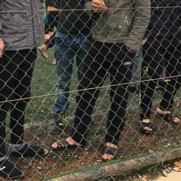 Boy prisoners in the yard of the Women and Children's Reformatory in Erbil, Kurdistan Region of Iraq. Many boys were detained on suspicion of links to the Islamic State
