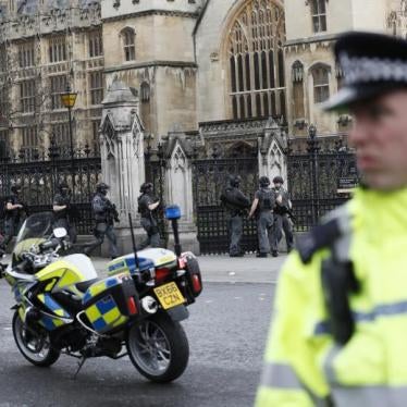 Armed police respond outside Parliament during an incident on Westminster Bridge.