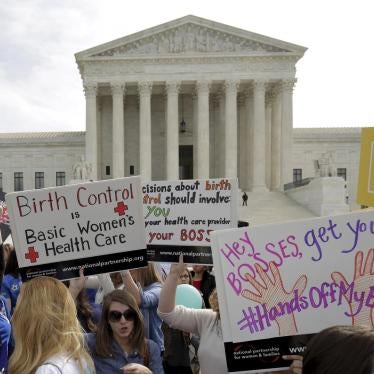 Supporters of contraception rally before Zubik v. Burwell, an appeal brought by Christian groups demanding full exemption from the requirement to provide insurance covering contraception under the Affordable Care Act, is heard by the U.S. Supreme Court. 