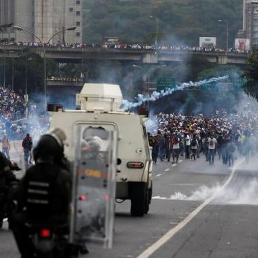 Police fire tear gas toward opposition supporters during clashes while rallying against Venezuela's President Nicolas Maduro in Caracas, Venezuela, April 20, 2017.