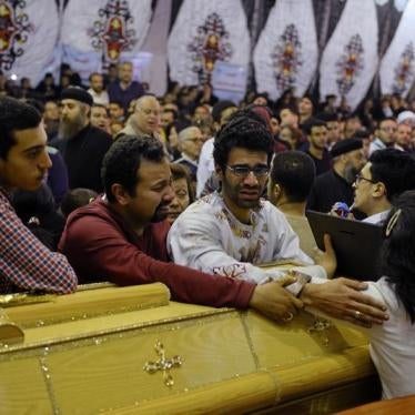 Relatives of victims react next to coffins arriving to the Coptic church that was bombed on Sunday in Tanta, Egypt, April 9, 2017. © 2017 Reuters