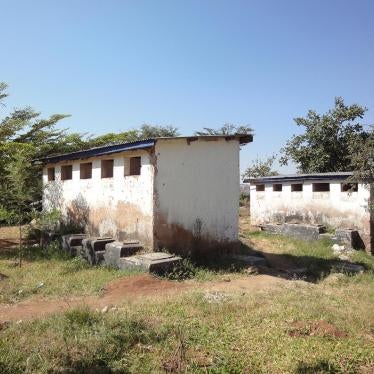 Female and male latrines at a secondary school in Mwanza, northeastern Tanzania. Many students told Human Rights Watch that they had to use dirty and congested pit latrines. 