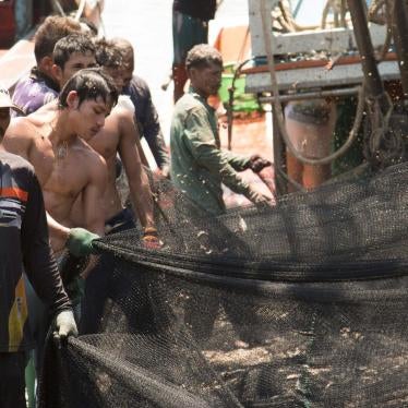 Fishers clean and prepare nets at a port in Phuket, Thailand, March 2016. 