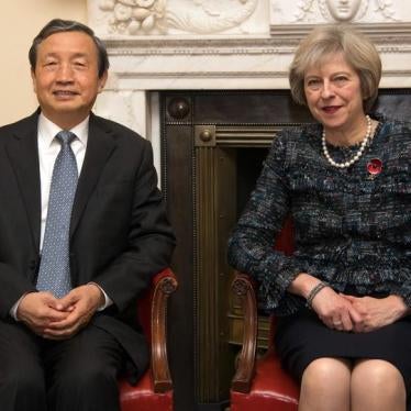 Britain's Prime Minister Theresa May (R) greets China's Vice Premier, Ma Kai, as he arrives in 10 Downing Street, in London November 9, 2016 in London.