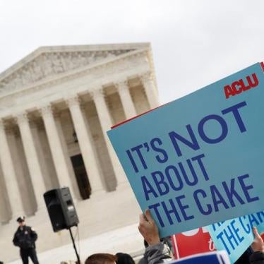 Demonstrators protest during oral arguments in the Masterpiece Cakeshop vs. Colorodo Civil Rights Commission case at the Supreme Court in Washington, U.S., December 5, 2017. 