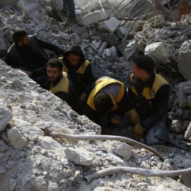 Syria Civil Defence members search for survivors after an airstrike in the besieged town of Hamoria, Eastern Ghouta, in Damascus, Syria Janauary 9, 2018.