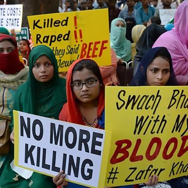 Indian demonstrators hold placards as they take part in a rally in New Delhi on July 18, 2017, in protest over a spate of assaults against Muslims and low-caste Dalits by Hindu vigilantes in India. /