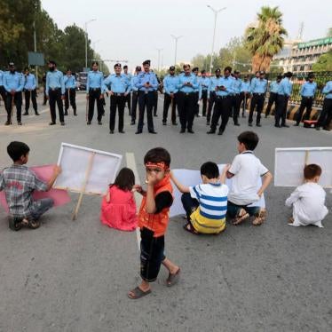 Children hold signs at a protest in Islamabad calling for greater security in the predominantly Shia city of Parachinar, Pakistan, June 27, 2017.
