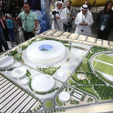 People look at a model of Al Thumama stadium during an unveiling ceremony at Hamad International Airport in Doha, Qatar, August 24, 2017. © 2017 REUTERS/Naseem Zeitoon