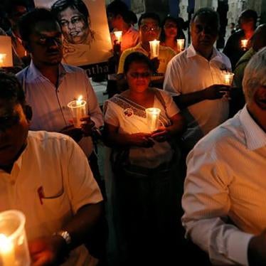 Demonstrators hold candles at a “Black January” vigil to commemorate killings and disappearances of Sri Lankan journalists, Colombo, Sri Lanka, January 24, 2017.