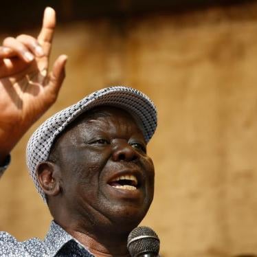 Opposition Movement for Democratic Change leader Morgan Tsvangirai addresses a crowd gathered outside parliament in Harare, Zimbabwe, November 21, 2017.