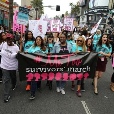 People participate in a protest march for survivors of sexual assault and their supporters in Hollywood, Los Angeles, California, U.S. November 12, 2017. 