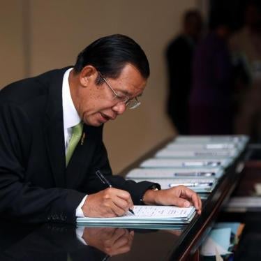 Prime Minister Hun Sen signs a register before a plenary session at the National Assembly of Cambodia, in Phnom Penh, February 14, 2018.