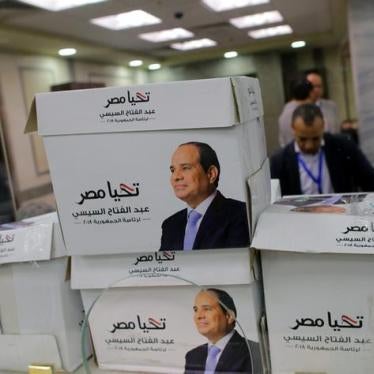 Members of the presidential campaign of Egypt's President Abdel Fattah al-Sisi count boxes containing his new presidential candidacy papers at the National Election Authority, which is in charge of supervising the 2018 presidential election in Cairo, Egyp