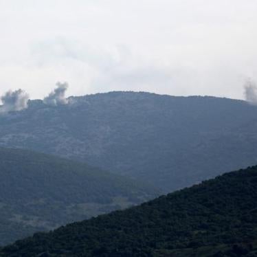 Smoke rises on the mountains as seen from Northern Afrin countryside, Syria on February 15, 2018.