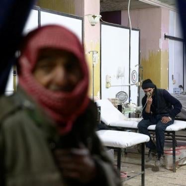 A man breathes through an oxygen mask at a medical center in Douma, Eastern Ghouta in Damascus, Syria January 22, 2018. 