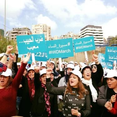 Women and men marching in Beirut, Lebanon on Sunday March 11, 2018 in honor of International Women’s Day on March 8, 2018.