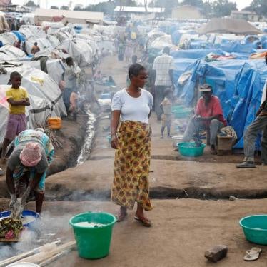 A woman walks at an internally displaced persons (IDP) camp in Bunia, Ituri province, eastern Democratic Republic of Congo, April 12, 2018. 
