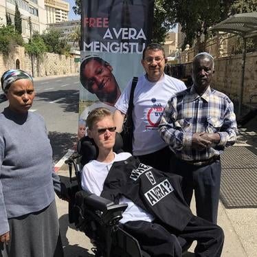 Avera Mangistu’s parents and disability rights activists at a protest tent in Jerusalem.