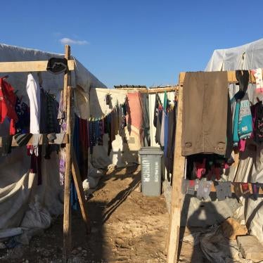 A clothesline in an informal tent settlement in Bar Elias, Bekaa Governorate, Lebanon. Refugees evicted from the Rayak air base area settled here in January 2018. The refugees say there was no procedure, no written notice, no opportunity to discuss or cha