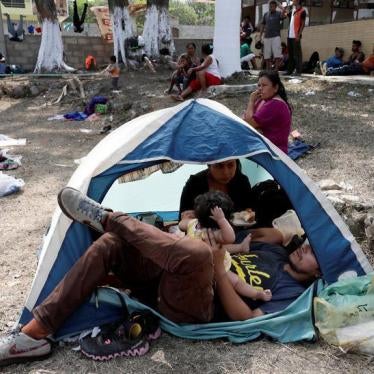 Central American migrants take a break from traveling in their caravan, as they journey to the U.S., in Matias Romero, Oaxaca, Mexico April 3, 2018.