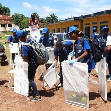 World Health Organization (WHO) workers prepare a center for vaccination during the launch of a campaign against an outbreak of Ebola in the port city of Mbandaka, Democratic Republic of Congo, May 21, 2018.