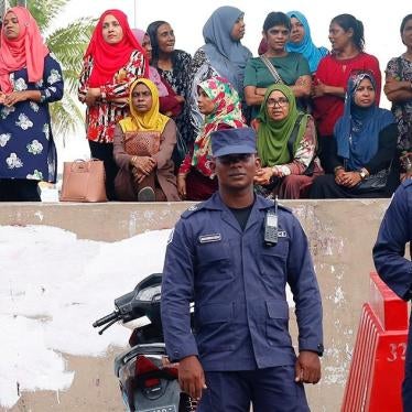 Police officers stand guard near the opposition party headquarters after President Abdulla Yameen declared a state of emergency in Male, Maldives, February 6, 2018.