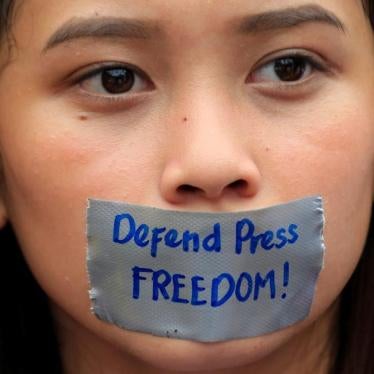 A member of the College Editors Guild of the Philippines protests outside the presidential palace in Metro Manila, Philippines, January 17, 2018.