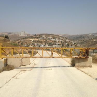 A road near the Israeli settlement of Dolev, where a gate blocks Palestinians from the nearby village of Ein Qinya from driving to the main road. 