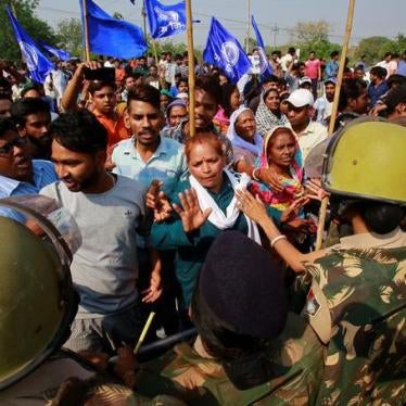 Police try to stop people belonging to the Dalit community as they take part in a protest during a nationwide strike called by Dalit organisations, in Chandigarh, India, April 2, 2018. REUTERS/Ajay Verma