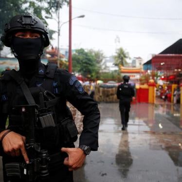 A counterterrorism police officer stands guard during a security sweep in Jakarta, Indonesia, February 16, 2018.