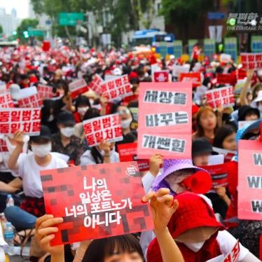  South Korean women march through the streets of Seoul
