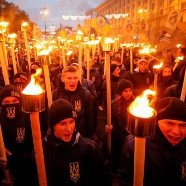 Activists and supporters of the Azov civil corp, Svoboda (Freedom), Ukrainian nationalist parties and the far-right radical group Right Sector take part in a rally to mark Defender of Ukraine Day