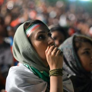 Women watch the 2018 FIFA World Cup match between Iran and Portugal in a public viewing event at Azadi Stadium in Tehran, Iran on June 25, 2018. © 2018 Getty Images