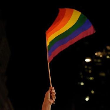 An activist waves a rainbow flag in Manhattan, New York, US, February 26, 2017. 